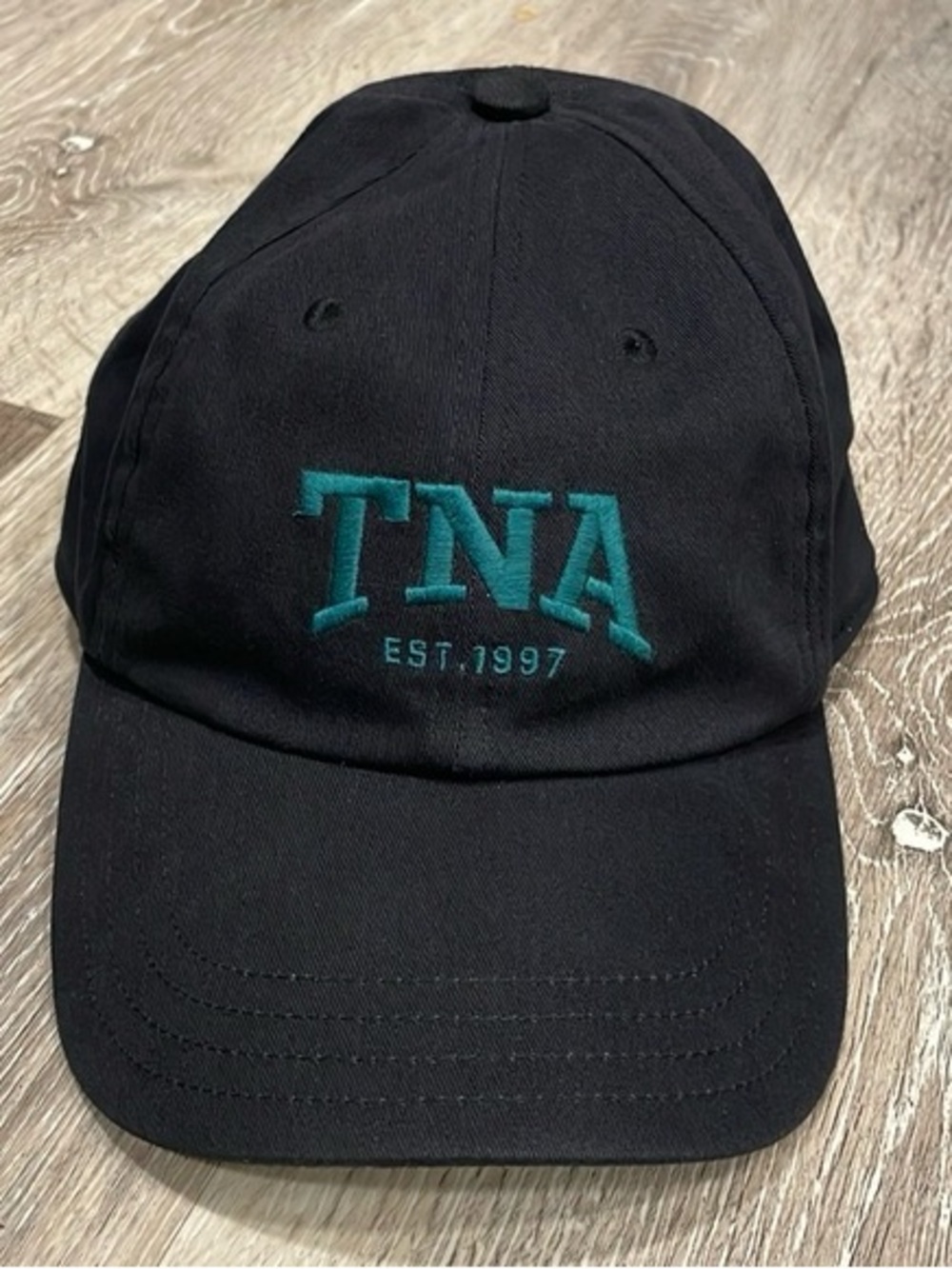 TNA Black Cap with Teal Embroidered Logo